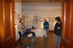 Tring exhibit setup, with Katrina, husband Hein, and helper finishing it up.