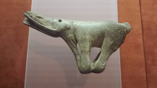 Mammoths seem to have been wiped out by a combination of climate change and habitat fragmentation, combined with what this item symbolizes: human hunting. This beautiful piece is the main part of an atlatl, or javelin-hurling lever. It would give Ice Age hunters the extra power they'd need to penetrate mammoth hide and cause mortal injuries.